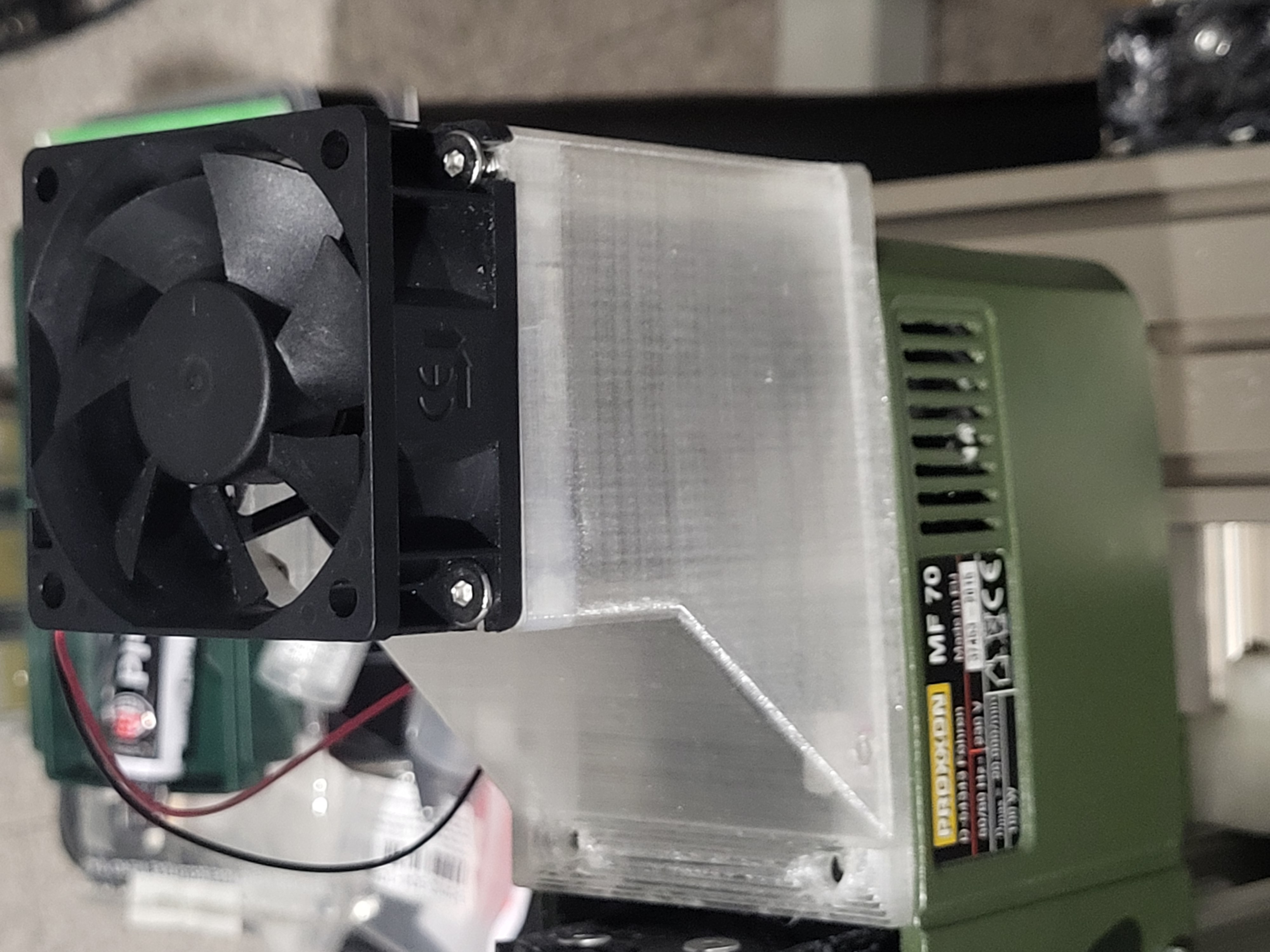 Complete BLDC motor assembly with protective cover and cooling fan installed