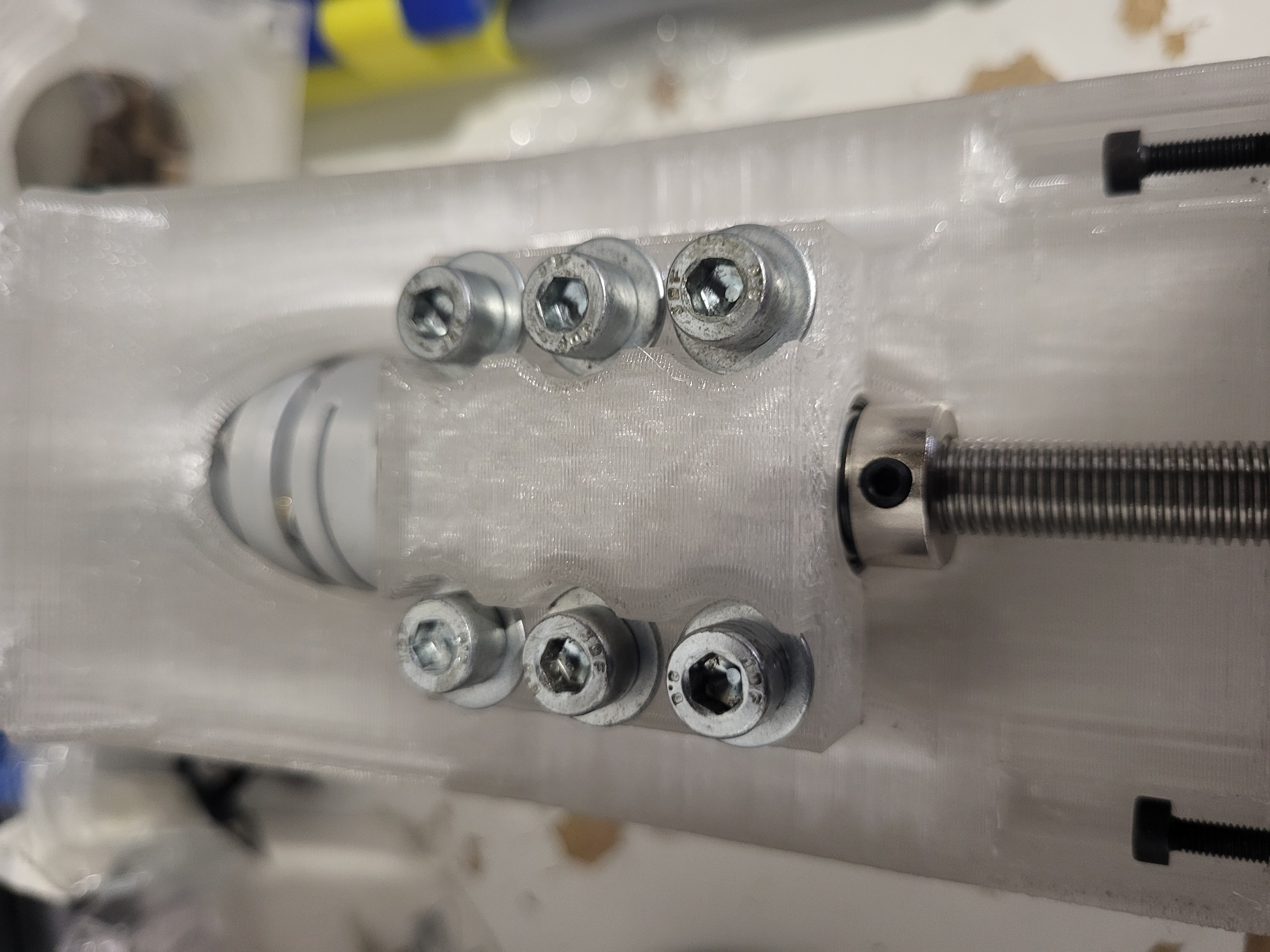 Complete bearing block assembly integrated with motor mount